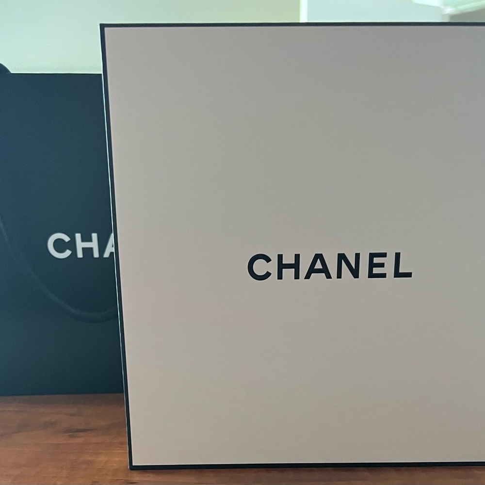 Brand New Never worn, store bought Chanel Rhinestone sunglasses in box.